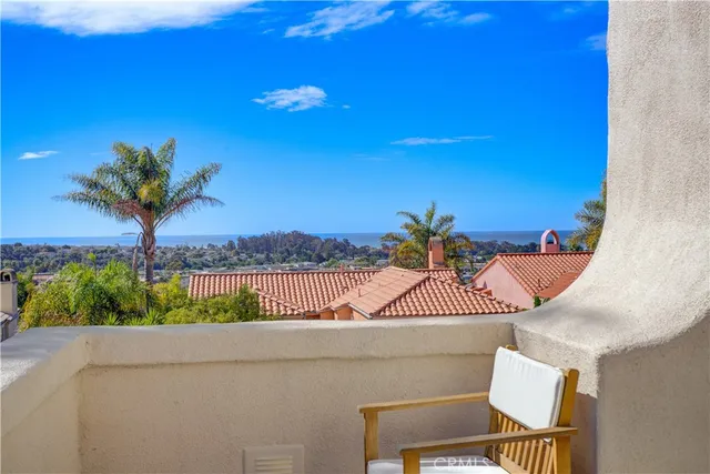 an aerial view of a city and mountain view in back