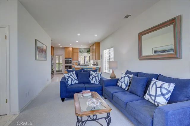 a kitchen with a stove a refrigerator and a sink
