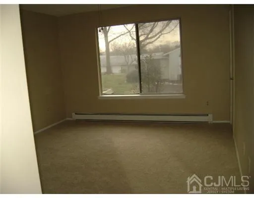 a view of a room that has a window in it