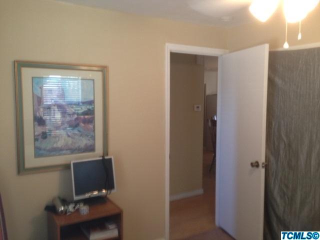 26451 Harrison Road Visalia, CA 93277 - Photo 9 of 16 a view of a workspace with furniture and a window
