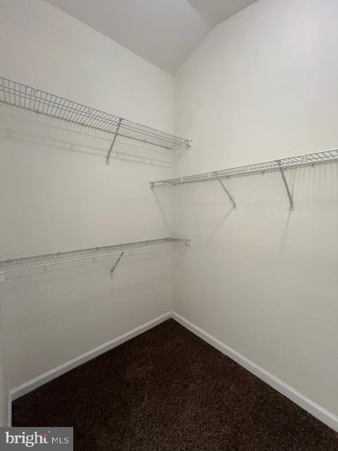 18704 Harmony Woods Lane Germantown, MD 20874 - Photo 11 of 21 a view of a room with racks on the wall