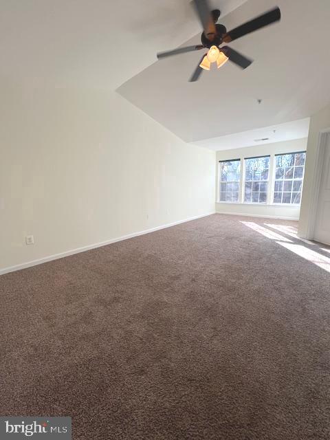 18704 Harmony Woods Lane Germantown, MD 20874 - Photo 14 of 21 an empty room with windows and fan