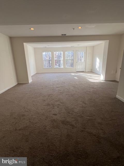 18704 Harmony Woods Lane Germantown, MD 20874 - Photo 18 of 21 a view of an empty room with a window