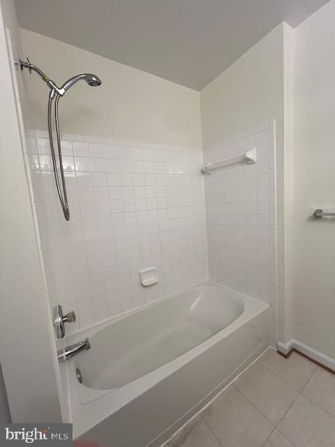 18704 Harmony Woods Lane Germantown, MD 20874 - Photo 10 of 21 a bathroom with a bathtub