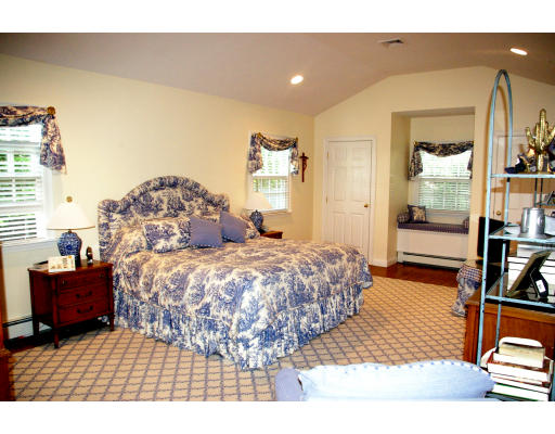 69 Bonwood Road Needham, MA 02492 - Photo 11 of 15 a bedroom with a bed and wooden floor