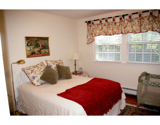 69 Bonwood Road Needham, MA 02492 - Photo 13 of 15 a bedroom with a bed and a window