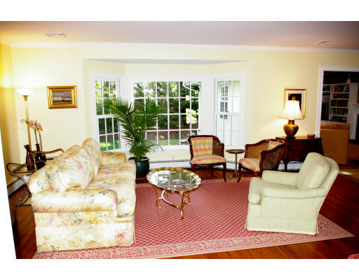 69 Bonwood Road Needham, MA 02492 - Photo 3 of 15 a living room with furniture and a large window