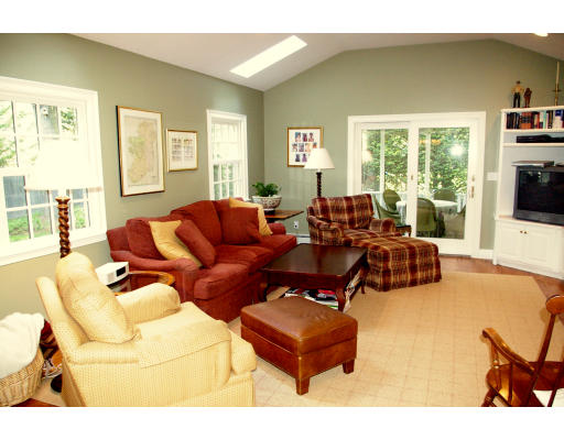 69 Bonwood Road Needham, MA 02492 - Photo 7 of 15 a living room with furniture and a flat screen tv
