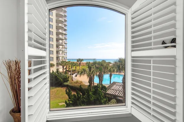 a view of a door and a window