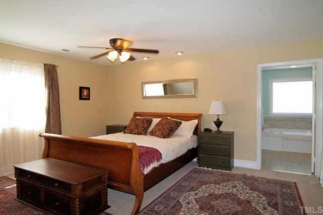 613 Mial Street Raleigh, NC 27608 - Photo 7 of 10 Master Bedroom suite features a quaint window seat.
