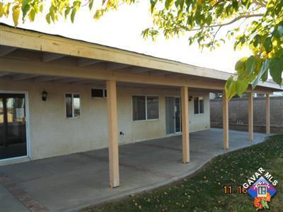 3249 Quarry Road Palmdale, CA 93550 - Photo 3 of 9 front view of a house with a yard