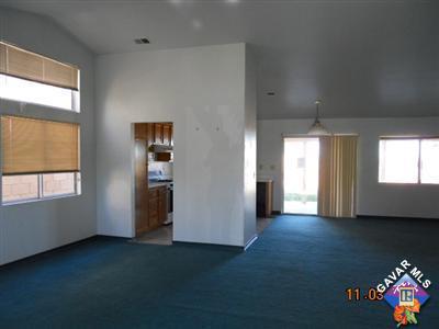 3249 Quarry Road Palmdale, CA 93550 - Photo 6 of 9 an empty room with windows