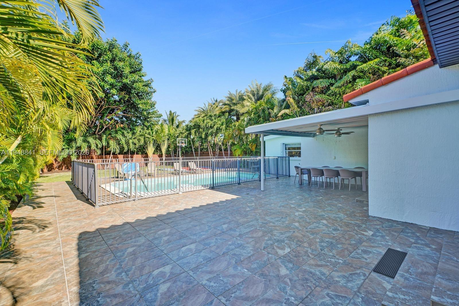 3757 Prairie Avenue Miami Beach, FL 33140 - Photo 16 of 19 a view of a backyard with a patio