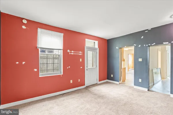an empty room with windows