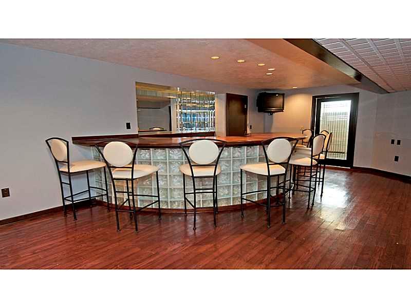 346 Germain Road Wexford, PA 15090 - Photo 14 of 20 Basement/Game Room. Large bar with bonus rom great for wine cellar.