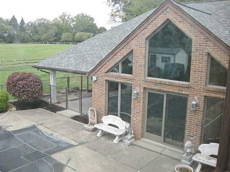 346 Germain Road Wexford, PA 15090 - Photo 18 of 20 View. View of great room off of pool and entertaining sized patio area.