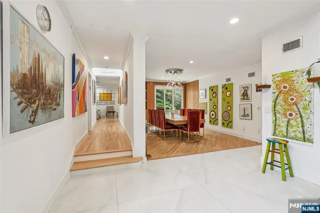 a view of a livingroom with furniture and a rug