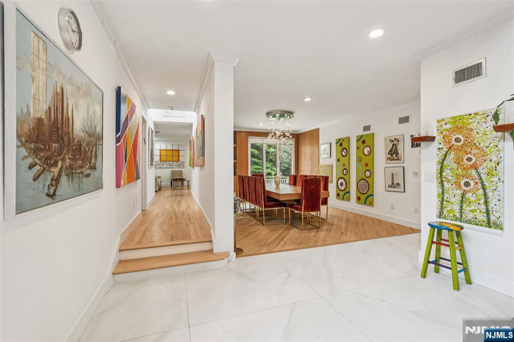 16 Schaffer Road Alpine, NJ 07620 - Photo 6 of 25 a view of a livingroom with furniture and a rug