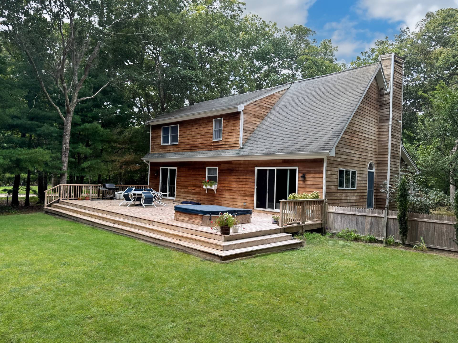 34 Old Fish Cove Road Southampton, NY 11968 - Photo 3 of 17 a view of house with a big yard and sitting area