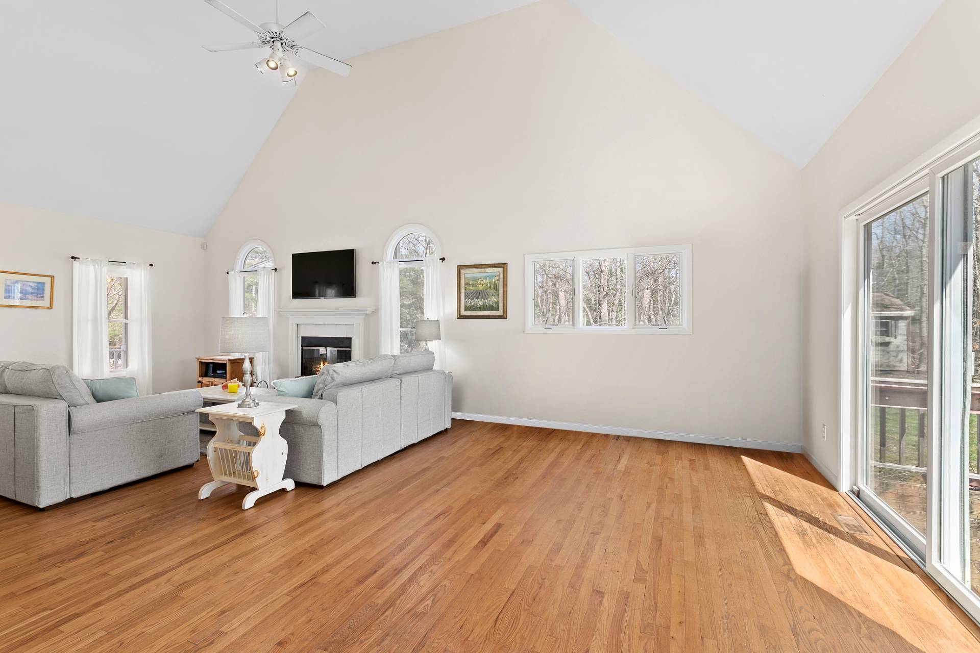 34 Old Fish Cove Road Southampton, NY 11968 - Photo 6 of 17 a living room with furniture and a fireplace