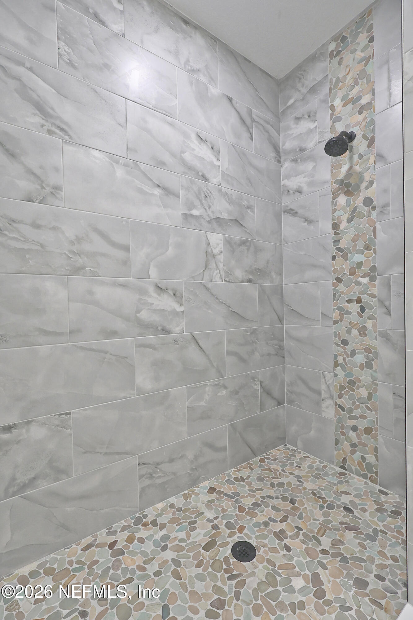 30 Delmonte Street Baldwin, FL 32234 - Photo 20 of 37 a bathroom with a shower