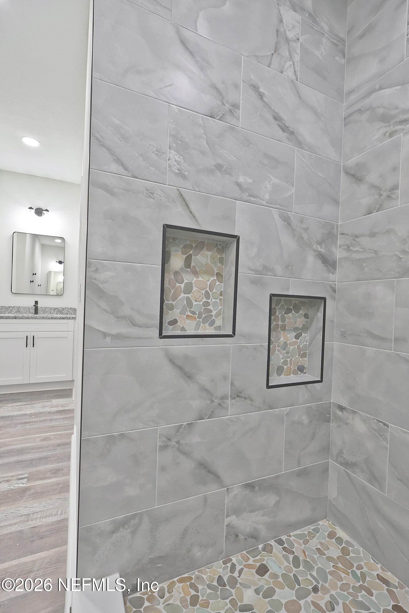 30 Delmonte Street Baldwin, FL 32234 - Photo 22 of 37 a bathroom with a shower