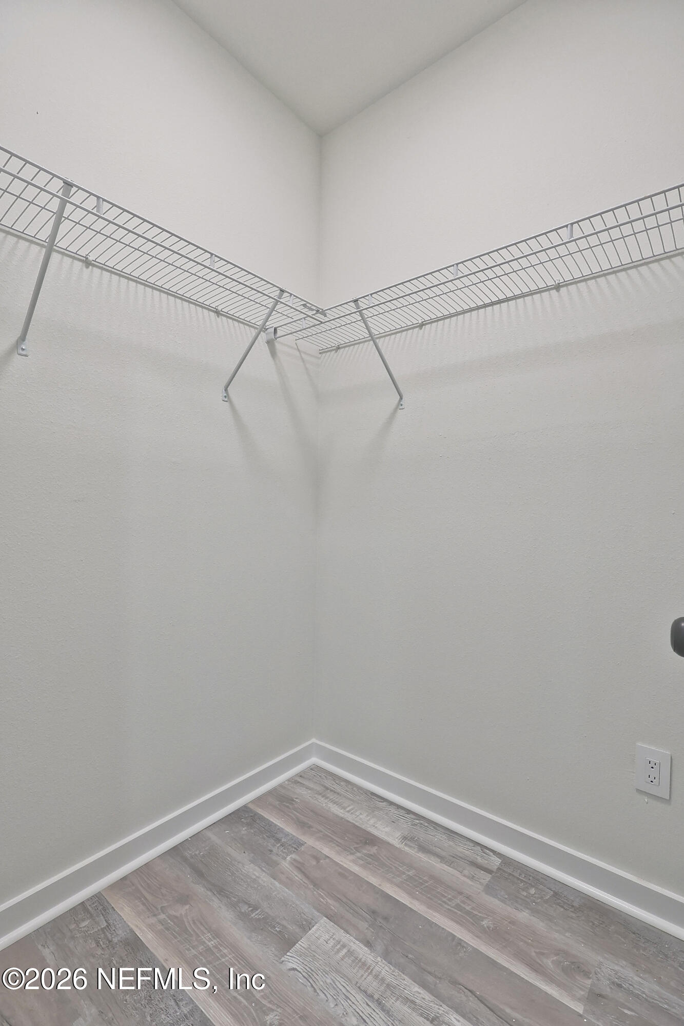 30 Delmonte Street Baldwin, FL 32234 - Photo 25 of 37 a view of a room with racks on the wall