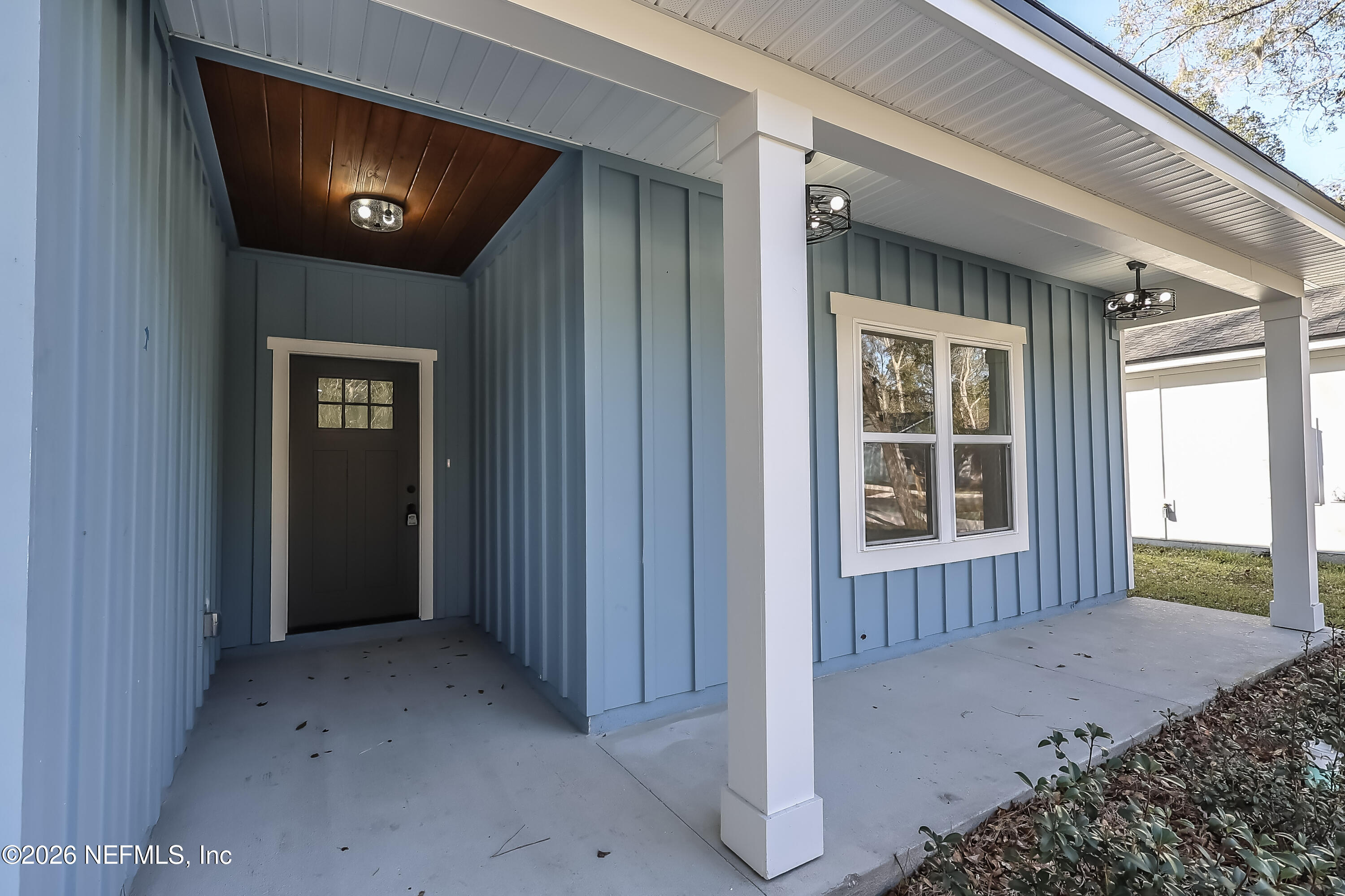 30 Delmonte Street Baldwin, FL 32234 - Photo 3 of 37 a view of an entryway of a house