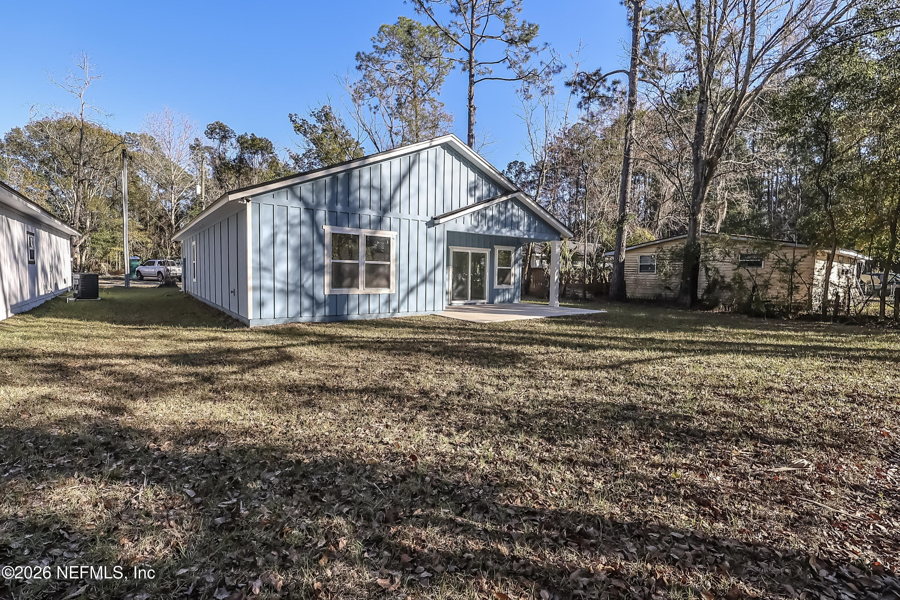 30 Delmonte Street Baldwin, FL 32234 - Photo 35 of 37 a view of a house with a yard