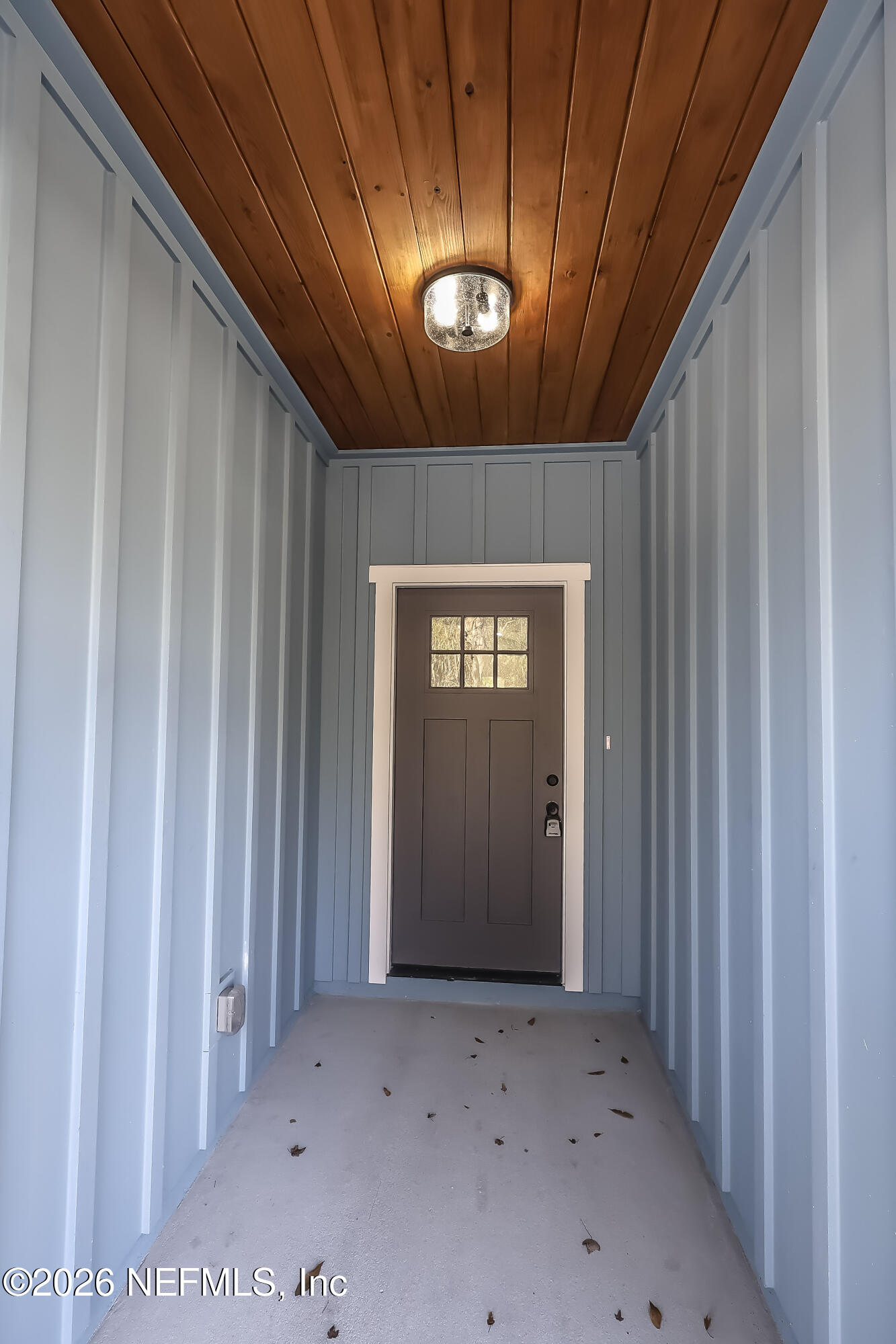 30 Delmonte Street Baldwin, FL 32234 - Photo 4 of 37 a view of an empty room with a window