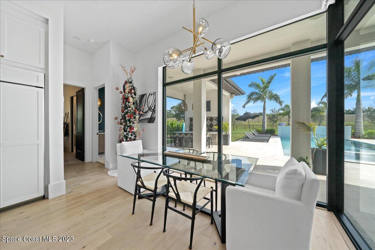 3022 BELLWIND Circle Rockledge, FL 32955 - Photo 14 of 46 a view of a dining room with furniture window and outside view
