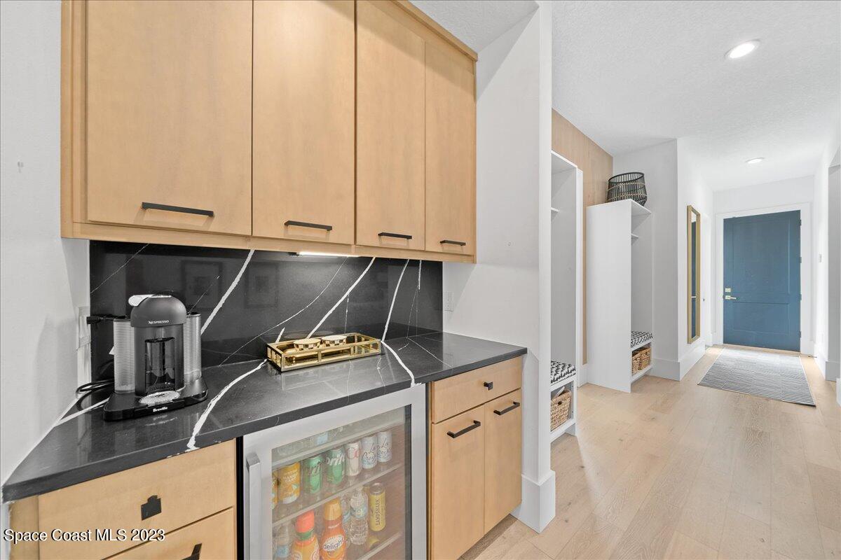 3022 BELLWIND Circle Rockledge, FL 32955 - Photo 16 of 46 a kitchen with stainless steel appliances granite countertop a refrigerator and a stove