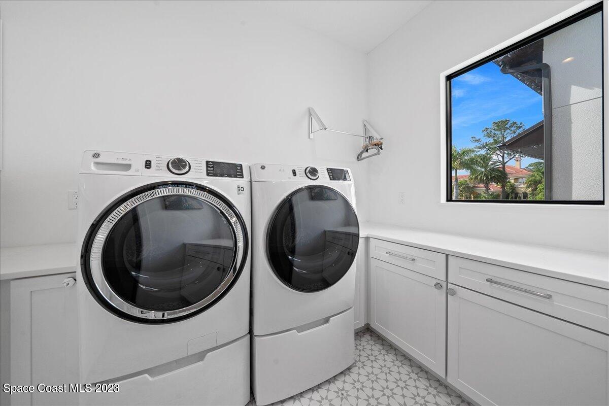 3022 BELLWIND Circle Rockledge, FL 32955 - Photo 27 of 46 a utility room with dryer and washer