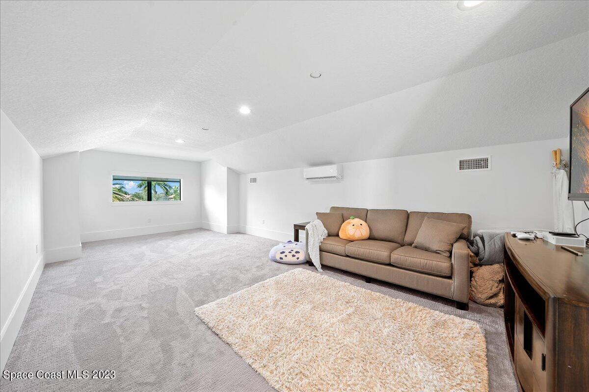 3022 BELLWIND Circle Rockledge, FL 32955 - Photo 34 of 46 a living room with furniture and window