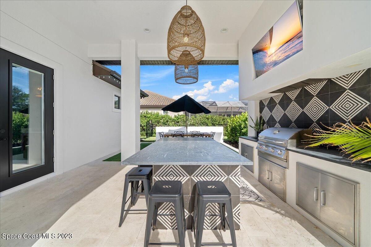 3022 BELLWIND Circle Rockledge, FL 32955 - Photo 39 of 46 a view of a dining room with furniture a rug and wooden floor