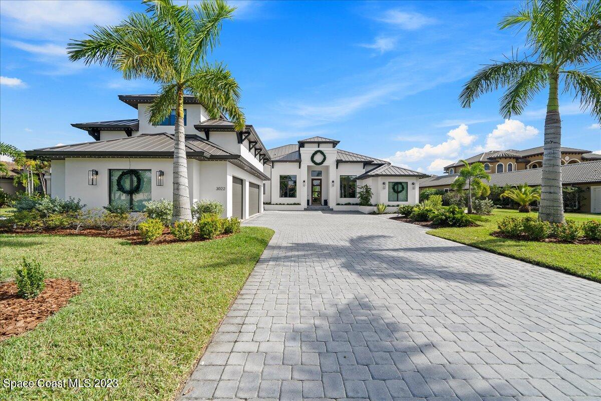 3022 BELLWIND Circle Rockledge, FL 32955 - Photo 43 of 46 a front view of house with yard and green space