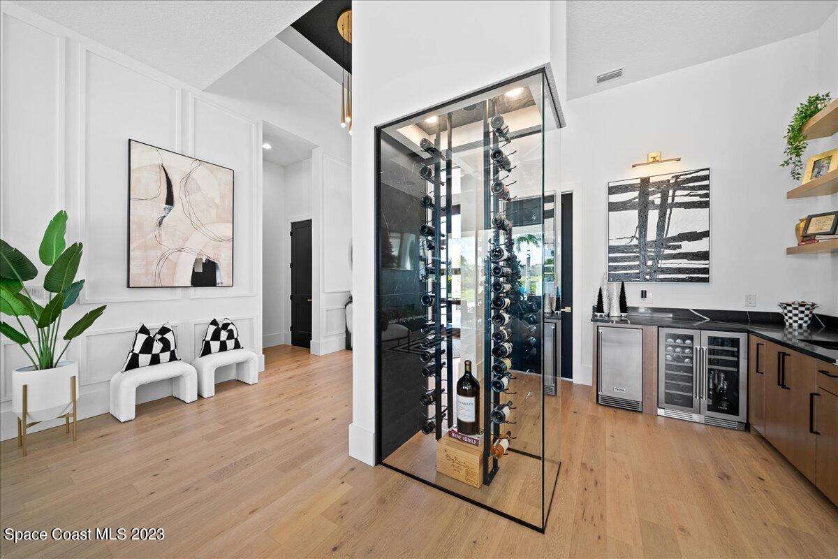 3022 BELLWIND Circle Rockledge, FL 32955 - Photo 6 of 46 a view of a kitchen with furniture and floor to ceiling window