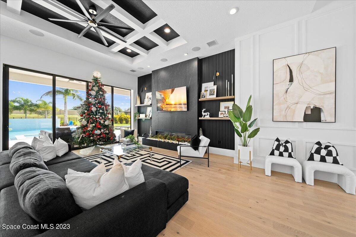 3022 BELLWIND Circle Rockledge, FL 32955 - Photo 7 of 46 a living room with furniture and a large window