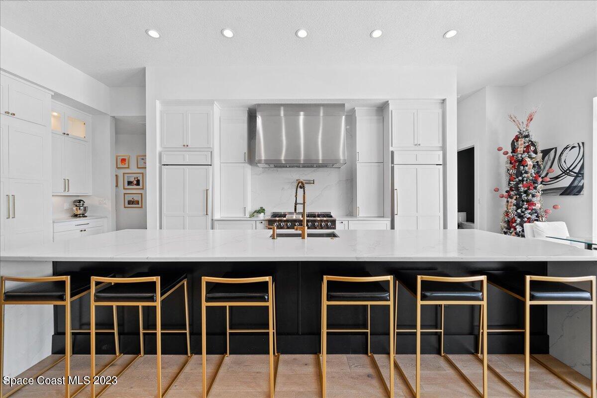 3022 BELLWIND Circle Rockledge, FL 32955 - Photo 10 of 46 a kitchen with cabinets table and chairs