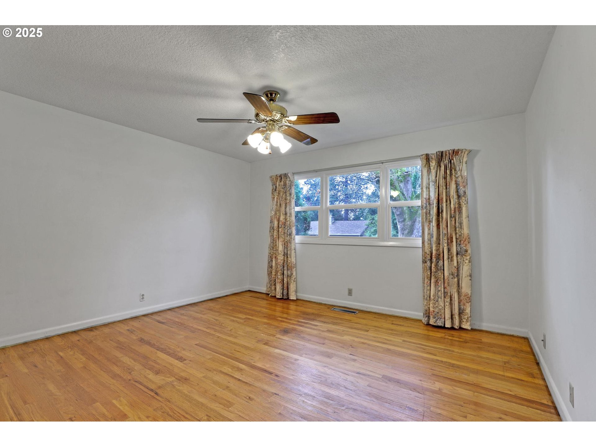 11500 Southwest 90th Avenue Portland, OR 97223 - Photo 13 of 30 a view of an empty room with a window