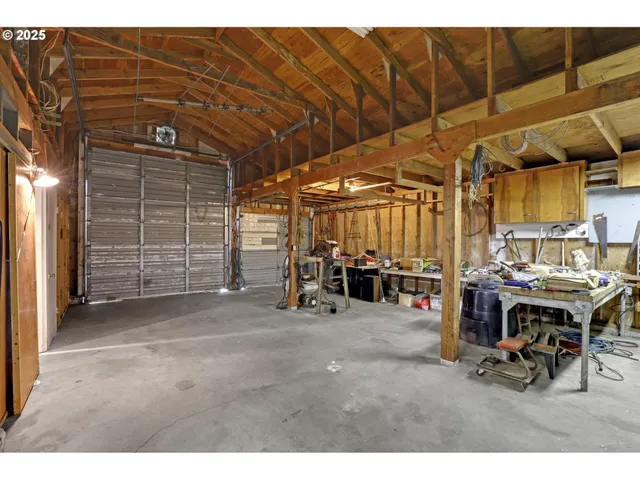 a view of a garage with table and chairs