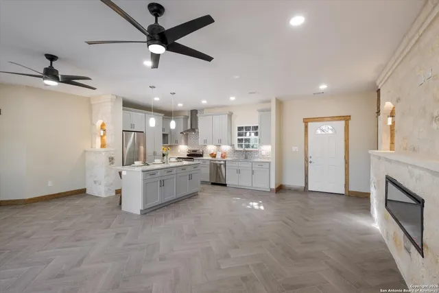 a view of a livingroom with a fireplace