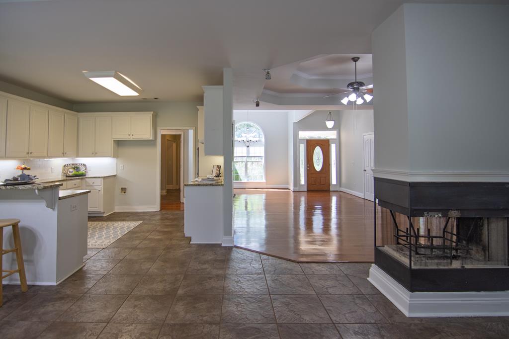 60 Roseanne Loop Hamilton, GA 31811 - Photo 13 of 54 a kitchen with refrigerator and cabinets