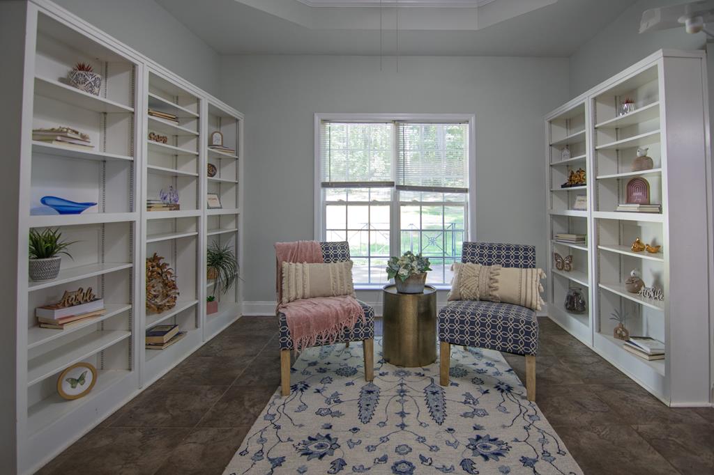 60 Roseanne Loop Hamilton, GA 31811 - Photo 14 of 54 a living room with furniture and a window