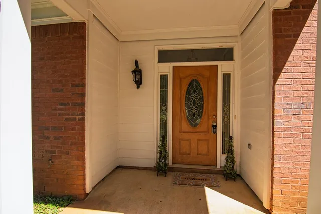 a house view with a garden space