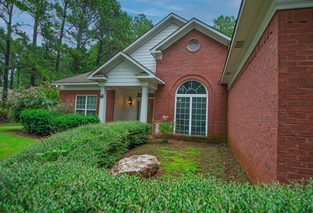 60 Roseanne Loop Hamilton, GA 31811 - Photo 4 of 54 a house view with a garden space