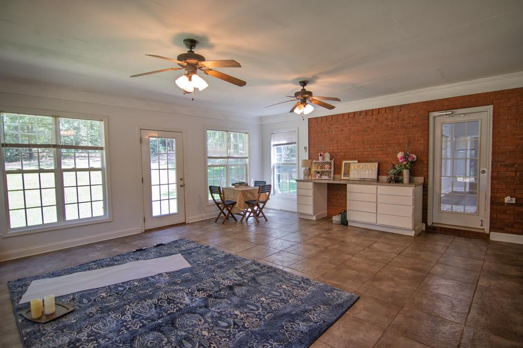 60 Roseanne Loop Hamilton, GA 31811 - Photo 46 of 54 a living room with furniture and window