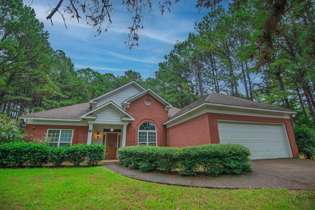 60 Roseanne Loop Hamilton, GA 31811 - Photo 6 of 54 a front view of a house with a yard