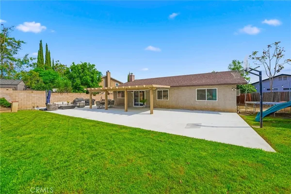 a house view with a garden space