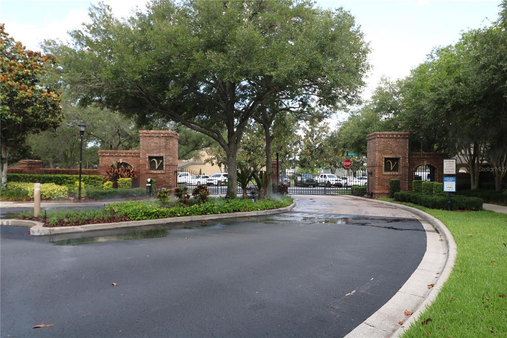 4866 Pond Ridge Drive Riverview, FL 33578 - Photo 6 of 38 a front view of a house with a garden and trees